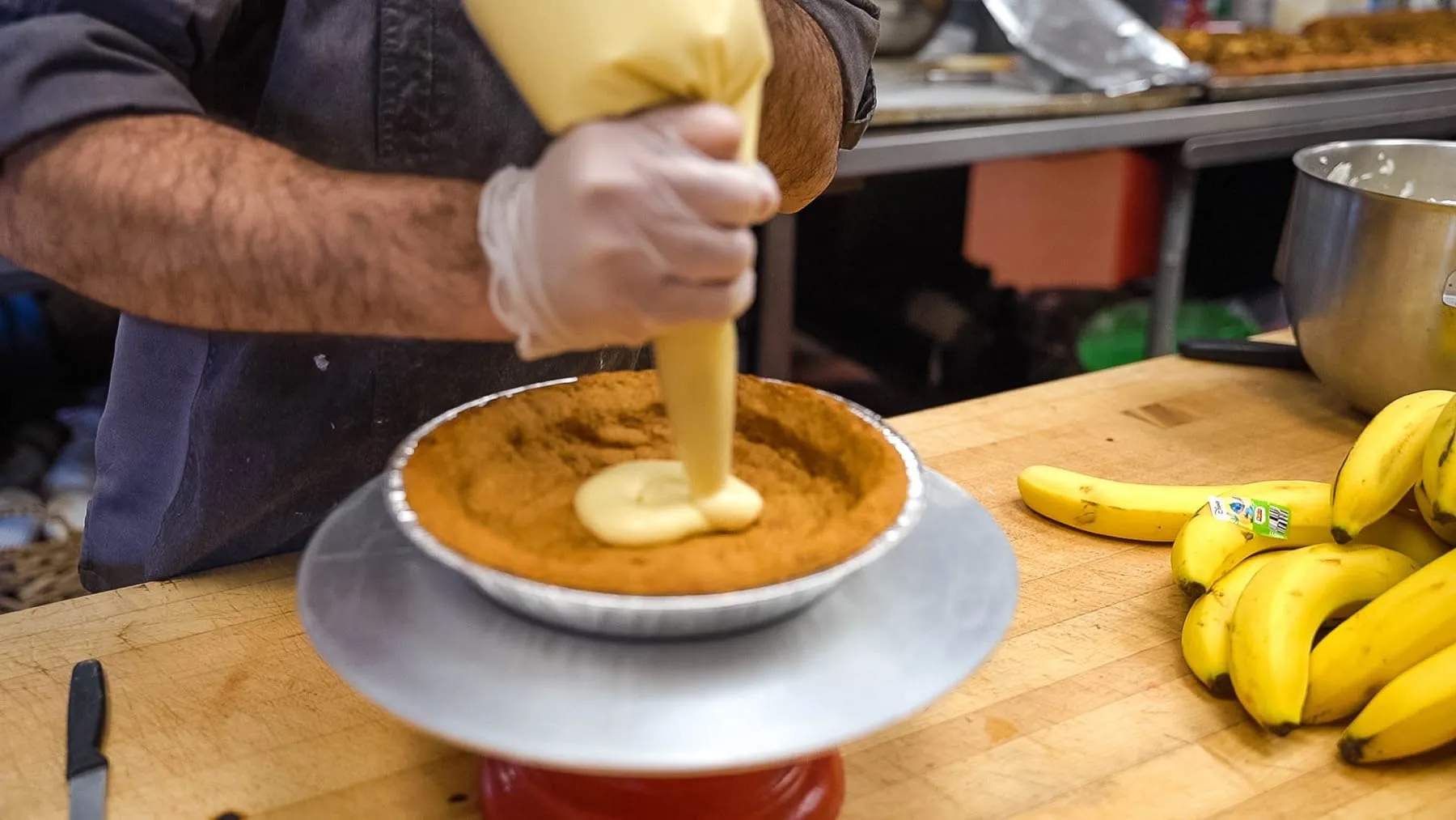 Making a banana cream pie in our kitchen